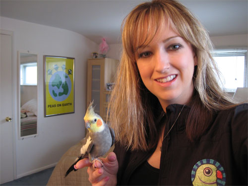 Michelle with a Birdorable Rose-ringed Parakeet Performance Jacket